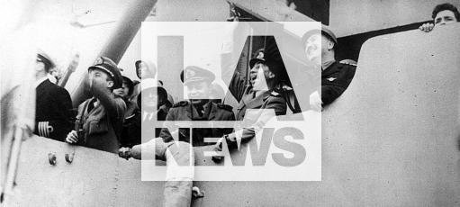 Buenos Aires, Argentina .-- On September 16, 2016, a new anniversary of the so-called "Liberating Revolution" is celebrated as the military dictatorship that ruled the Argentine Republic is known after having overthrown the constitutional president Juan Domingo Perón, the Congress closed National, deposed members of the Supreme Court, provincial, municipal and university authorities and commissioned the entire Judiciary through a coup d'etat initiated on September 16, 1955. In the photo file Admiral Isaac Francisco Rojas arrives at the port of Buenos Aires after the triumph of the coup (second from the right) Admiral Isaac Francisco Rojas arrives at the port of Buenos Aires Rojas was an Argentine naval military, who served as de facto vice president from 1955 to 1958. He led the coup against the government of Juan Domingo Perón with Eduardo Lonardi in September 1955.