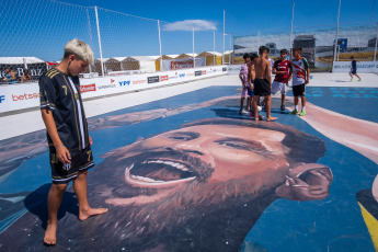 Mar del Plata, Argentina.- In the photos taken on January 15, 2024, the Lionel Messi mural painted by two artists from the city of Mar del Plata is shown. The mural, almost 100 square meters on the cement floor of a football field, in a resort in Punta Mogotes, pays tribute to Lionel Messi a year after commanding the Argentine team that became world champion in Qatar.